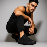 Chaussures de course ARDEN Sneakers de Olyndra London en noir, vue de face, détails du design sportif et moderne.