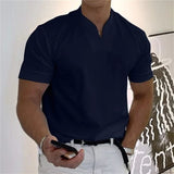 T-shirt business fitness ETHAN de Olyndra London, vêtement sportif élégant en coton gris avec logo sur le devant.