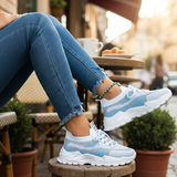 Coffrets de baskets confortables pour femme Airflow AirSynq de la marque Olyndra London, avec ventilation et design léger.
