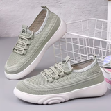 Mocassins élégants et confortables Olyndra London pour femmes, en cuir noir avec semelle en caoutchouc, vue de côté.