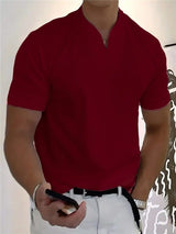 T-shirt business fitness ETHAN de Olyndra London, tissu confortable, coupe moderne, en gris avec logo discret.