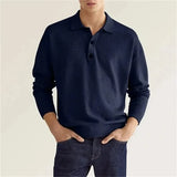 Polo en laine CORVIN Olyndra London avec col et manches longues, couleur gris foncé, porté sur un mannequin.