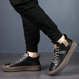 Baskets de course Olyndra London MARSTON Sneakers de course noires avec semelle blanche, vue de face.