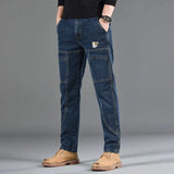 Jean utilitaire Hardland de Olyndra London, pantalon de travail robuste avec poches renforcées et coupe pratique, porté sur mannequin.