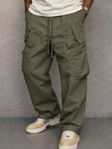 Pantalon utilitaire George de la marque Olyndra London, style pratique avec plusieurs poches, en tissu robuste, vue de face.