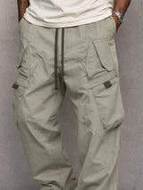 Pantalon utilitaire George de la marque Olyndra London, style pratique avec poches multiples et tissu robuste, vue de face
