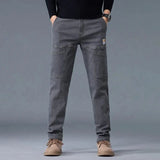 Jean utilitaire Hardland de Olyndra London, pantalon de travail robuste avec poches pratiques pour homme.