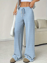 Pantalon détente BOARDWALK de la marque Olyndra London, tissu confortable et coupe décontractée, vue de face.
