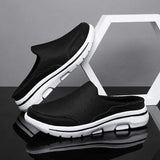 Baskets mules Brookvale de la marque Olyndra London, vue de face avec design en cuir blanc et semelle blanche.