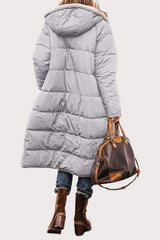 Manteau double face NOA Olyndra London en tissu doux, porté en extérieur avec col et manches longues, style élégant.